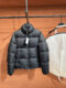 Dior Oblique puffer jas zwart met reliëf monogram, vooraanzicht